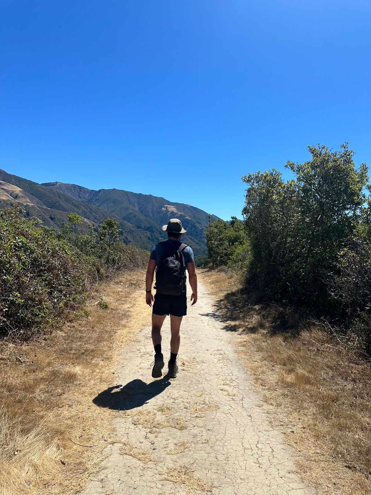 Brook Stacey on a mountain trail, the pilgrimage metaphor at the root of Pilgrim Therapy